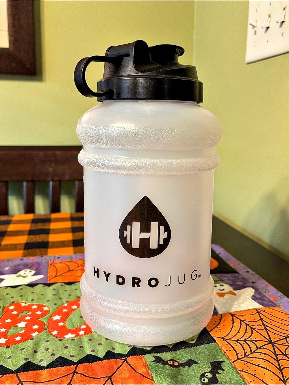 HydroJug Classic 73 oz Water Bottle clear with black lid.